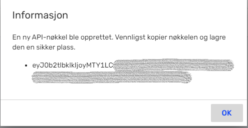 Dialogboks med beskjed om ny API-nøkkel klar til kopiering og lagring